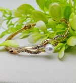 Graceful Adjustable Bracelet with Dazzling Pearl Accent - Image 3
