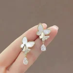Double Butterfly Hanging Pearl Earings - Image 3